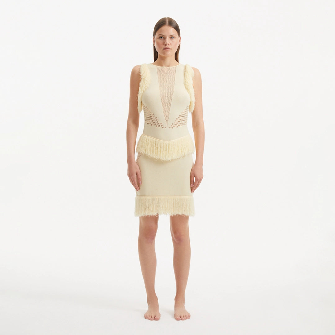 Diani Yellow Fringe Detail Sheer Panel Open Back Mini Dress | Moeva | Dress | Each week unveils new pieces—luxury swimwear, fluid resort silhouettes, and elevated summer-to-evening essentials designed to carry you from coastal escapes to city nights.