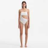 Marilla White Bandeau Satin Swimsuit | Moeva | Swimsuit | Each week unveils new pieces—luxury swimwear, fluid resort silhouettes, and elevated summer-to-evening essentials designed to carry you from coastal escapes to city nights.