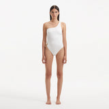 Kaimana White One Shoulder Satin Swimsuit | Moeva | Swimsuit | Each week unveils new pieces—luxury swimwear, fluid resort silhouettes, and elevated summer-to-evening essentials designed to carry you from coastal escapes to city nights.