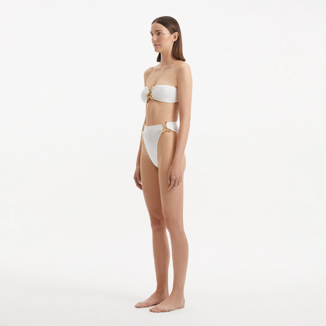 Clyde White Bandeau High Waist Satin Bikini Set | Moeva | Bikini Set | Each week unveils new pieces—luxury swimwear, fluid resort silhouettes, and elevated summer-to-evening essentials designed to carry you from coastal escapes to city nights.