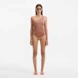 Kaimana Brown One Shoulder Satin Swimsuit | Moeva | Swimsuit | Each week unveils new pieces—luxury swimwear, fluid resort silhouettes, and elevated summer-to-evening essentials designed to carry you from coastal escapes to city nights.