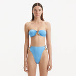 Clyde Baby Blue Bandeau High Waist Satin Bikini Set | Moeva | Bikini Set | Each week unveils new pieces—luxury swimwear, fluid resort silhouettes, and elevated summer-to-evening essentials designed to carry you from coastal escapes to city nights.