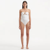 Kenna White Bandeau Satin Swimsuit | Moeva | Swimsuit | Each week unveils new pieces—luxury swimwear, fluid resort silhouettes, and elevated summer-to-evening essentials designed to carry you from coastal escapes to city nights.