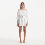 Sumner White Off-Shoulder Linen Mini Dress | Moeva | Dress | Each week unveils new pieces—luxury swimwear, fluid resort silhouettes, and elevated summer-to-evening essentials designed to carry you from coastal escapes to city nights.