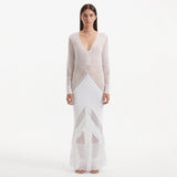 Elba White Long Sleeve Knit Fringe Maxi Dress | Moeva | Dress | Each week unveils new pieces—luxury swimwear, fluid resort silhouettes, and elevated summer-to-evening essentials designed to carry you from coastal escapes to city nights.