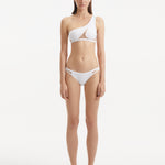 Harbor White One Shoulder Solid Bikini Top | Moeva | Bikini Top | Each week unveils new pieces—luxury swimwear, fluid resort silhouettes, and elevated summer-to-evening essentials designed to carry you from coastal escapes to city nights.