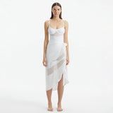 Pelagia White Tie Front Wavy-Trim Sheer Sarong | Moeva | Sarong | Each week unveils new pieces—luxury swimwear, fluid resort silhouettes, and elevated summer-to-evening essentials designed to carry you from coastal escapes to city nights.