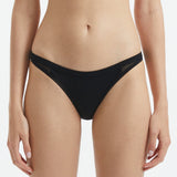 Harbor Black Mid Coverage Solid Bikini Bottom | Moeva | Bikini Bottom | Each week unveils new pieces—luxury swimwear, fluid resort silhouettes, and elevated summer-to-evening essentials designed to carry you from coastal escapes to city nights.