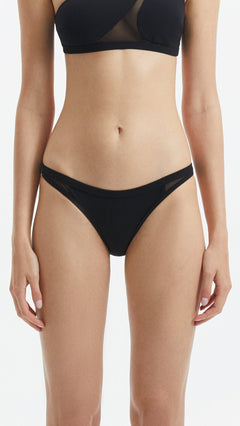Harbor Black Mid Coverage Solid Bikini Bottom | Moeva | Bikini Bottom | Each week unveils new pieces—luxury swimwear, fluid resort silhouettes, and elevated summer-to-evening essentials designed to carry you from coastal escapes to city nights.