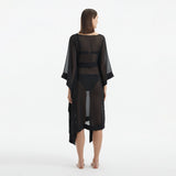 Opal Black Sheer Gold Buttoned Belted Kaftan | Moeva | Kaftan | Each week unveils new pieces—luxury swimwear, fluid resort silhouettes, and elevated summer-to-evening essentials designed to carry you from coastal escapes to city nights.