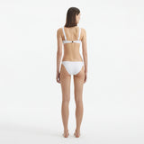 Aeron White V Neck Textured Mid Coverage Bikini Set | Moeva | | Each week unveils new pieces—luxury swimwear, fluid resort silhouettes, and elevated summer-to-evening essentials designed to carry you from coastal escapes to city nights.