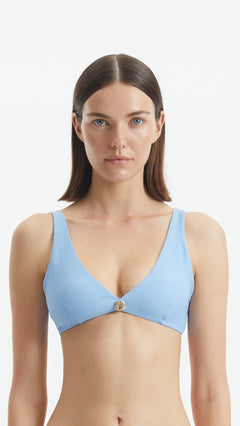 Aeron Baby Blue V Neck Textured Bikini Top | Moeva | Bikini Top | Each week unveils new pieces—luxury swimwear, fluid resort silhouettes, and elevated summer-to-evening essentials designed to carry you from coastal escapes to city nights.