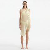 Adora Yellow Sheer Sleeveless Asymmetric Dress with Gold Button Detail | Moeva | Dress | Each week unveils new pieces—luxury swimwear, fluid resort silhouettes, and elevated summer-to-evening essentials designed to carry you from coastal escapes to city nights.