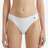 Eyre White Mid Coverage Textured Bikini Bottom | Moeva | Bikini Bottom | Each week unveils new pieces—luxury swimwear, fluid resort silhouettes, and elevated summer-to-evening essentials designed to carry you from coastal escapes to city nights.