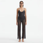 Luz Silver Metallic Sheer Knit Pants | Moeva | Pants | Each week unveils new pieces—luxury swimwear, fluid resort silhouettes, and elevated summer-to-evening essentials designed to carry you from coastal escapes to city nights.