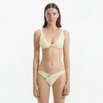Aeron Yellow V Neck Textured Mid Coverage Bikini Set | Moeva | Bikini Set | Each week unveils new pieces—luxury swimwear, fluid resort silhouettes, and elevated summer-to-evening essentials designed to carry you from coastal escapes to city nights.