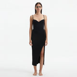 Beau Black Sleeveless Knitted Long Dress with Side Slit | Moeva | Dress | Each week unveils new pieces—luxury swimwear, fluid resort silhouettes, and elevated summer-to-evening essentials designed to carry you from coastal escapes to city nights.