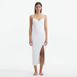 Beau White Sleeveless Knitted Long Dress with Side Slit | Moeva | Dress | Each week unveils new pieces—luxury swimwear, fluid resort silhouettes, and elevated summer-to-evening essentials designed to carry you from coastal escapes to city nights.