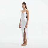 Beau White Sleeveless Knitted Long Dress with Side Slit | Moeva | RTW Dresses | Each week unveils new pieces—luxury swimwear, fluid resort silhouettes, and elevated summer-to-evening essentials designed to carry you from coastal escapes to city nights.