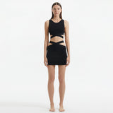 Garda Black Knitted Cut-Out Crop Top | Moeva | Crop Top | Each week unveils new pieces—luxury swimwear, fluid resort silhouettes, and elevated summer-to-evening essentials designed to carry you from coastal escapes to city nights.