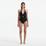 Imelda Black Halterneck Swimsuit with Gold Detail | Moeva | Swimsuit | Each week unveils new pieces—luxury swimwear, fluid resort silhouettes, and elevated summer-to-evening essentials designed to carry you from coastal escapes to city nights.