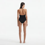 Imelda Black Halterneck Swimsuit with Gold Detail | Moeva | Swimsuit | Each week unveils new pieces—luxury swimwear, fluid resort silhouettes, and elevated summer-to-evening essentials designed to carry you from coastal escapes to city nights.