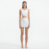 Garda White Knitted Cut-Out Crop Top | Moeva | Crop Top | Each week unveils new pieces—luxury swimwear, fluid resort silhouettes, and elevated summer-to-evening essentials designed to carry you from coastal escapes to city nights.
