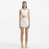 Jazero White Knitted Cut-Out Skirt | Moeva | Skirt | Each week unveils new pieces—luxury swimwear, fluid resort silhouettes, and elevated summer-to-evening essentials designed to carry you from coastal escapes to city nights.