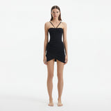 Osaka Black Corset Mini Dress with Wrap Skirt | Moeva | RTW Dresses | Each week unveils new pieces—luxury swimwear, fluid resort silhouettes, and elevated summer-to-evening essentials designed to carry you from coastal escapes to city nights.