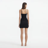 Osaka Black Corset Mini Dress with Wrap Skirt | Moeva | RTW Dresses | Each week unveils new pieces—luxury swimwear, fluid resort silhouettes, and elevated summer-to-evening essentials designed to carry you from coastal escapes to city nights.