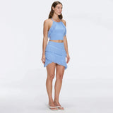 Nebula Blue Fringe Detail Halter Knit Top | Moeva | Crop Top | Each week unveils new pieces—luxury swimwear, fluid resort silhouettes, and elevated summer-to-evening essentials designed to carry you from coastal escapes to city nights.
