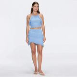 Arlo Baby Blue Fringe Detail Asymmetric Mini Skirt | Moeva | Skirt | Each week unveils new pieces—luxury swimwear, fluid resort silhouettes, and elevated summer-to-evening essentials designed to carry you from coastal escapes to city nights.