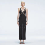 Odessa Black V Neck Knit Maxi Dress | Moeva | Dress | Each week unveils new pieces—luxury swimwear, fluid resort silhouettes, and elevated summer-to-evening essentials designed to carry you from coastal escapes to city nights.