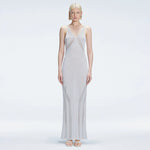 Odessa Silver V Neck Knit Maxi Dress | Moeva | Dress | Each week unveils new pieces—luxury swimwear, fluid resort silhouettes, and elevated summer-to-evening essentials designed to carry you from coastal escapes to city nights.