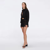 Ophelia Black Crochet Detail High-Waist Shorts | Moeva | Shorts | Each week unveils new pieces—luxury swimwear, fluid resort silhouettes, and elevated summer-to-evening essentials designed to carry you from coastal escapes to city nights.