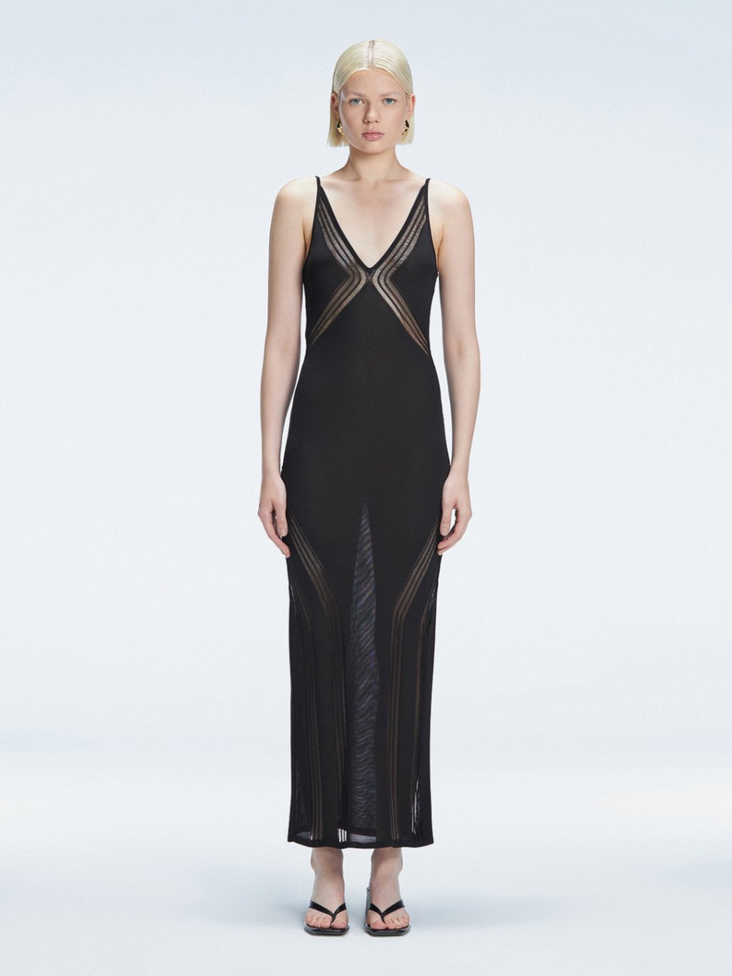 Chiara King - Odessa Black V Neck Knit Maxi Dress | Moeva | | Each week unveils new pieces—luxury swimwear, fluid resort silhouettes, and elevated summer-to-evening essentials designed to carry you from coastal escapes to city nights.