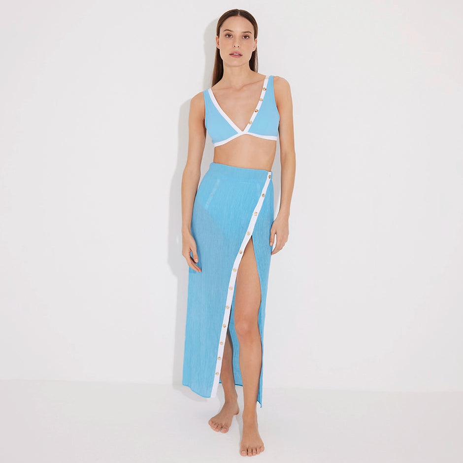 Pina Blue/White Asymmetric Gold Button Maxi Skirt | Moeva | Skirt | Each week unveils new pieces—luxury swimwear, fluid resort silhouettes, and elevated summer-to-evening essentials designed to carry you from coastal escapes to city nights.