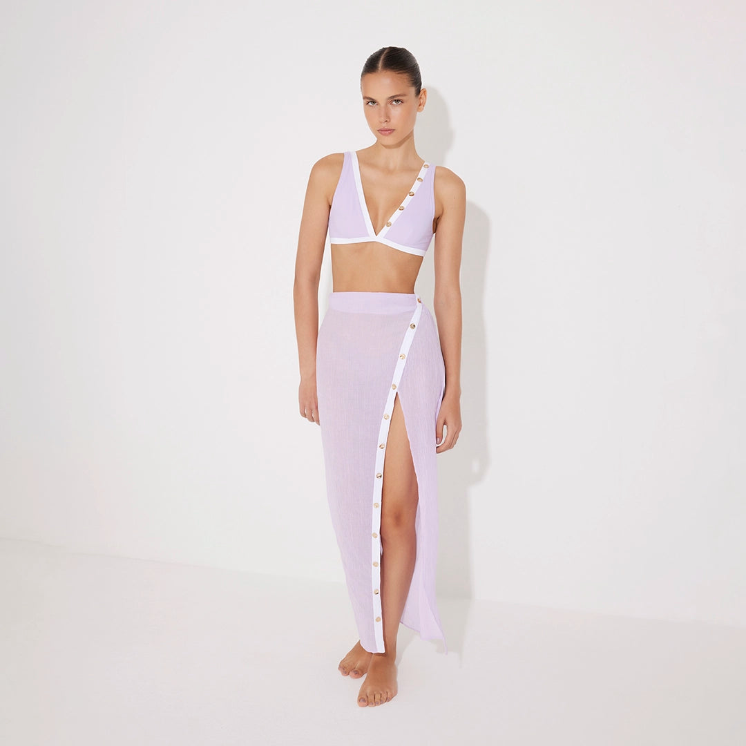 Pina Lilac/White Asymmetric Gold Button Maxi Skirt | Moeva | Beachwear Skirts | Each week unveils new pieces—luxury swimwear, fluid resort silhouettes, and elevated summer-to-evening essentials designed to carry you from coastal escapes to city nights.