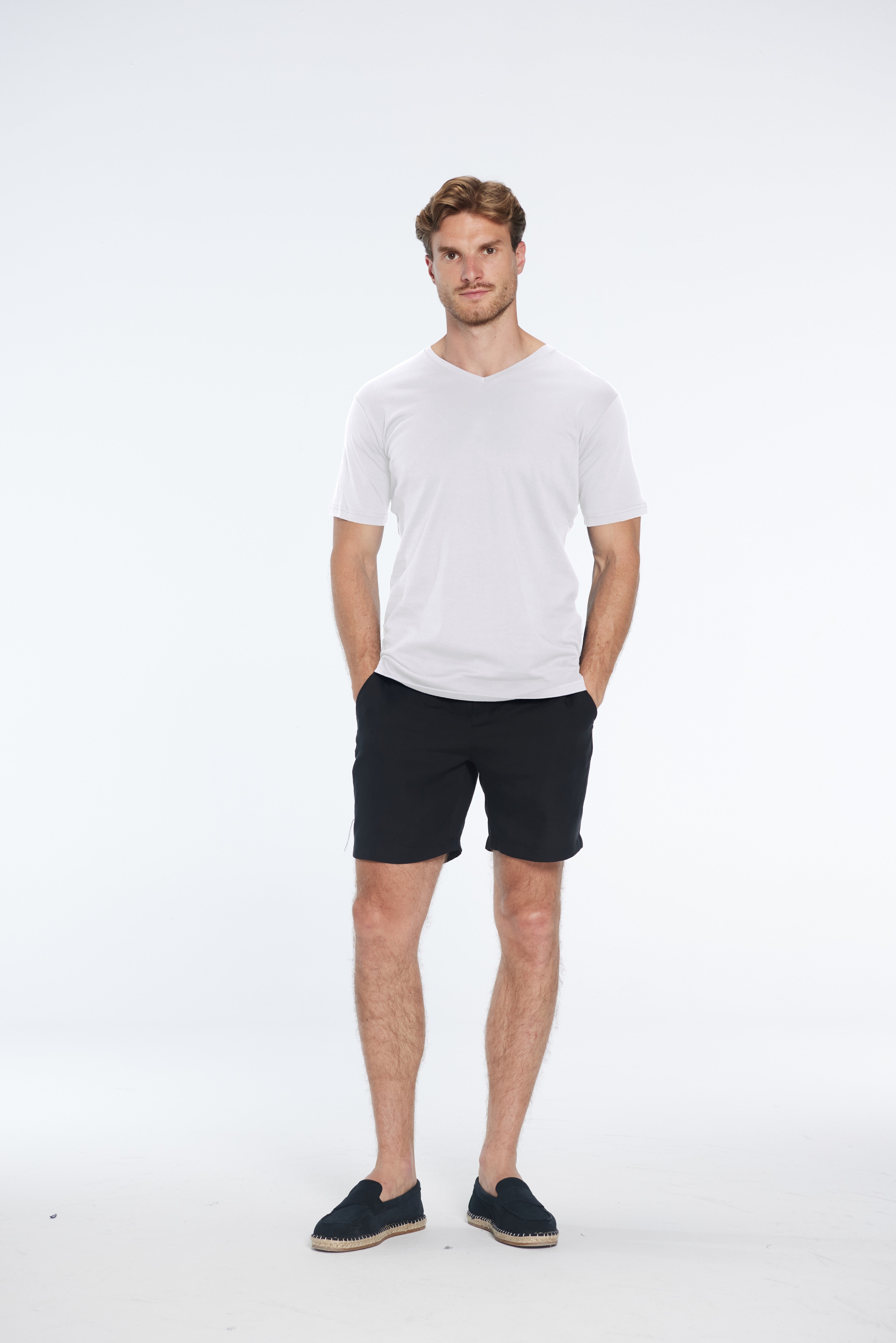 Rex White V-Neck Cotton T-Shirt | Moeva | Men V-Neck Shirts | Each week unveils new pieces—luxury swimwear, fluid resort silhouettes, and elevated summer-to-evening essentials designed to carry you from coastal escapes to city nights.