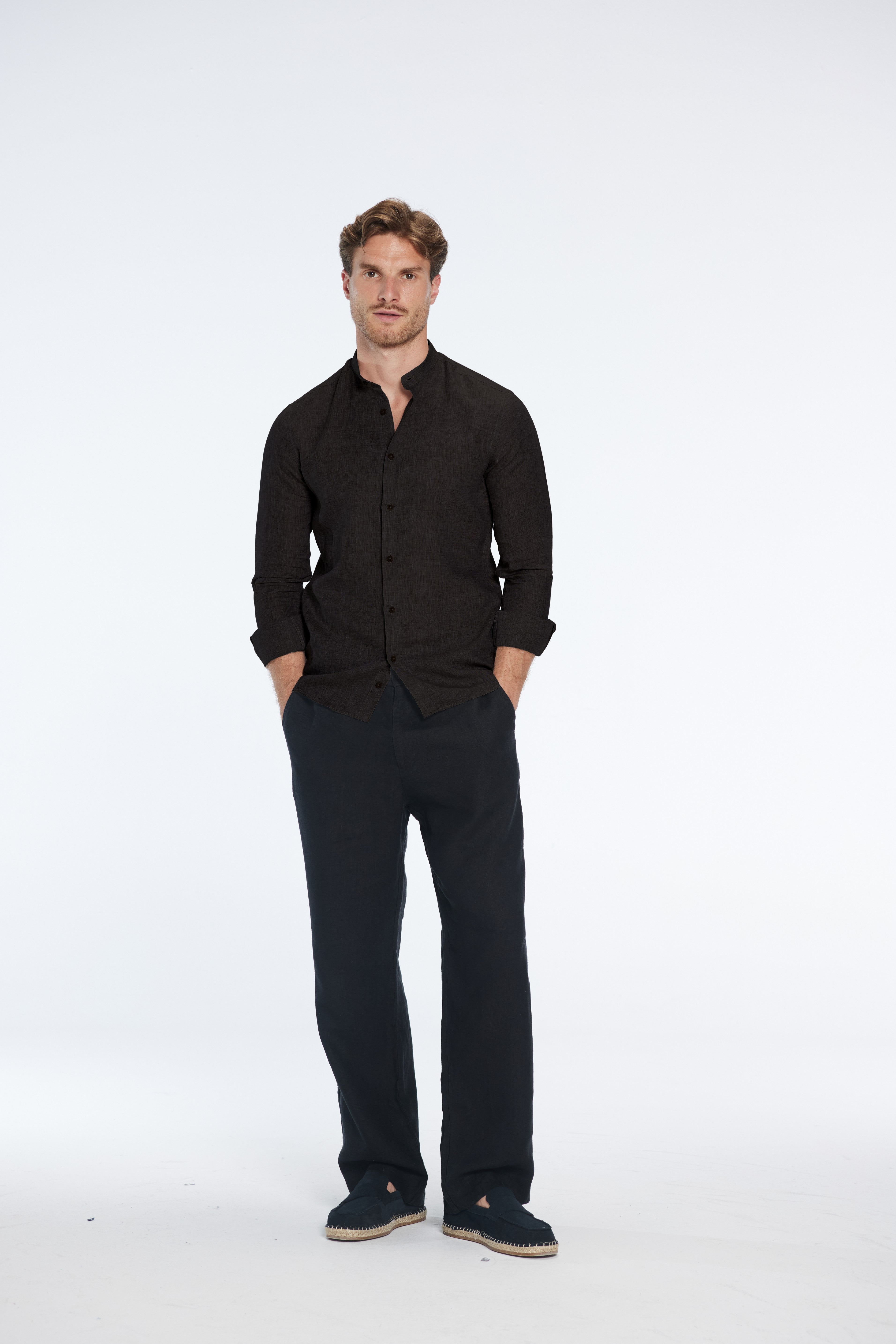 Ryan Black Linen Shirt with Grandad Collar | Moeva | Men Mandarin Collar Shirts | Each week unveils new pieces—luxury swimwear, fluid resort silhouettes, and elevated summer-to-evening essentials designed to carry you from coastal escapes to city nights.