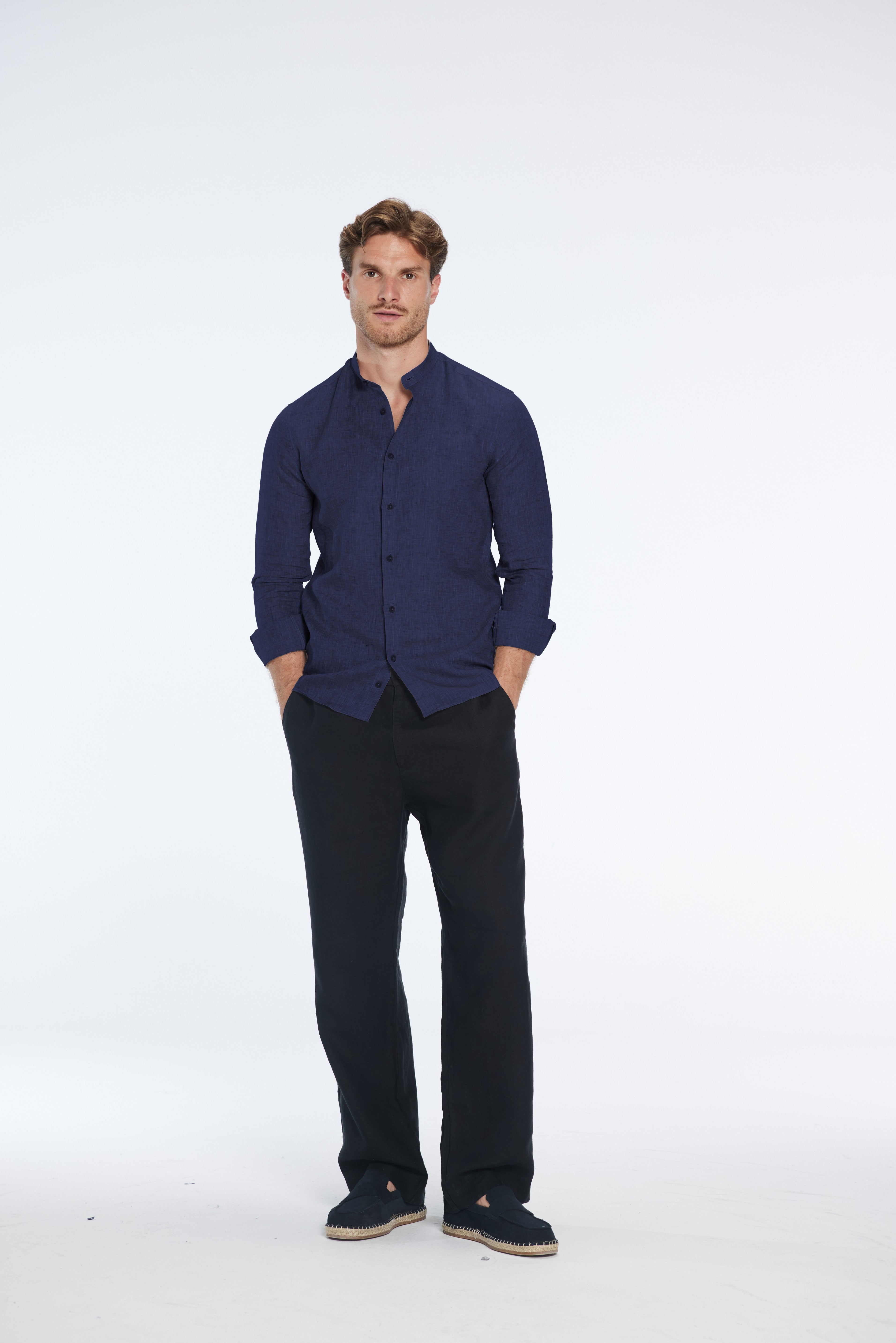 Ryan Dark Blue Linen Shirt with Grandad Collar | Moeva | Men Mandarin Collar Shirts | Each week unveils new pieces—luxury swimwear, fluid resort silhouettes, and elevated summer-to-evening essentials designed to carry you from coastal escapes to city nights.