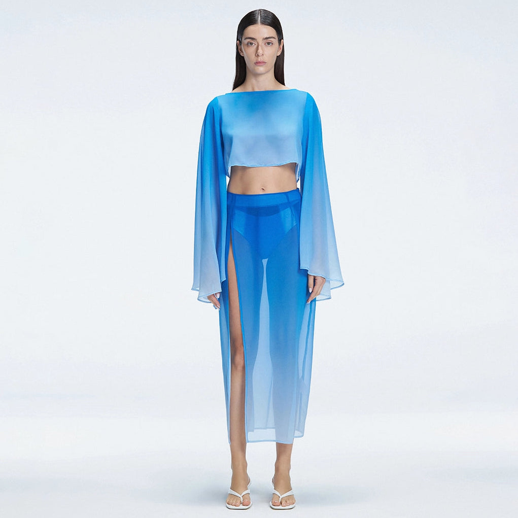 Samantha Blue Optical Long Sleeve Crop Top | Moeva | Crop Top | Each week unveils new pieces—luxury swimwear, fluid resort silhouettes, and elevated summer-to-evening essentials designed to carry you from coastal escapes to city nights.