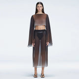 Samantha Long Sleeve Crop Top and Tabitha Maxi Skirt Black Optical Set | Moeva | Set | Each week unveils new pieces—luxury swimwear, fluid resort silhouettes, and elevated summer-to-evening essentials designed to carry you from coastal escapes to city nights.