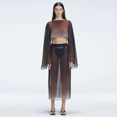 Tabitha Black Optical Maxi Skirt | Moeva | Skirt | Each week unveils new pieces—luxury swimwear, fluid resort silhouettes, and elevated summer-to-evening essentials designed to carry you from coastal escapes to city nights.
