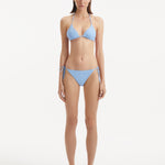 Sarita Baby Blue Triangle Wave Textured Bikini Top | Moeva | Bikini Top | Each week unveils new pieces—luxury swimwear, fluid resort silhouettes, and elevated summer-to-evening essentials designed to carry you from coastal escapes to city nights.