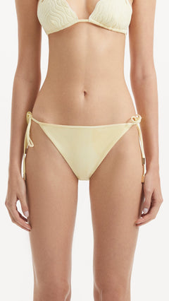 Sarita Yellow Side Tie Bikini Bottom | Moeva | Bikini Bottom | Each week unveils new pieces—luxury swimwear, fluid resort silhouettes, and elevated summer-to-evening essentials designed to carry you from coastal escapes to city nights.