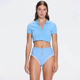Shandy Baby Blue Polo Collar Knitted Crop Top | Moeva | RTW Bustiers | Each week unveils new pieces—luxury swimwear, fluid resort silhouettes, and elevated summer-to-evening essentials designed to carry you from coastal escapes to city nights.