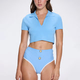 Shandy Baby Blue Polo Collar Knitted Crop Top | Moeva | RTW Bustiers | Each week unveils new pieces—luxury swimwear, fluid resort silhouettes, and elevated summer-to-evening essentials designed to carry you from coastal escapes to city nights.