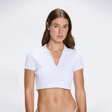 Shandy White Polo Collar Knitted Crop Top | Moeva | RTW Bustiers | Each week unveils new pieces—luxury swimwear, fluid resort silhouettes, and elevated summer-to-evening essentials designed to carry you from coastal escapes to city nights.