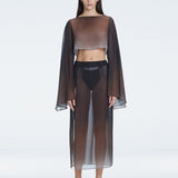 Front view of model wearing Samantha Black Degraded Top and Tabitha Skirt with long sleeves and printed mesh fabric.